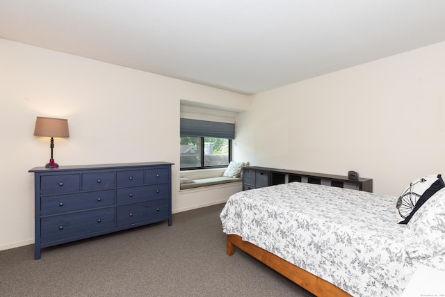 512 Heritage Vlg Unit B, Southbury, CT 06488 - bedroom with dark carpet and baseboards