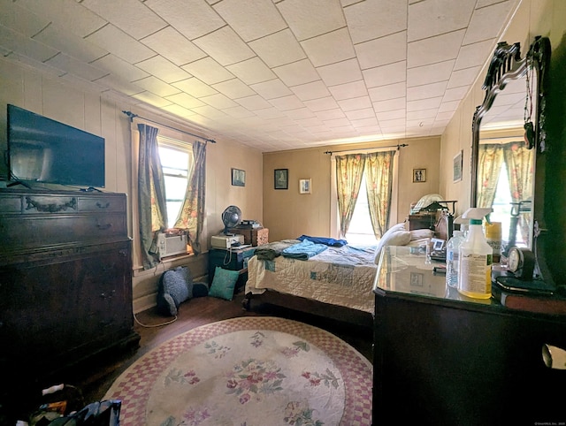 415 N Main St, Winchester, CT 06098 - bedroom featuring multiple windows, wood finished floors, and cooling unit