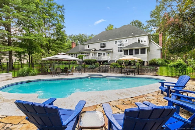 4 Brighton Ln, Simsbury, CT 06070 - view of swimming pool with a gazebo, a patio area, a pool with connected hot tub, and outdoor dining area