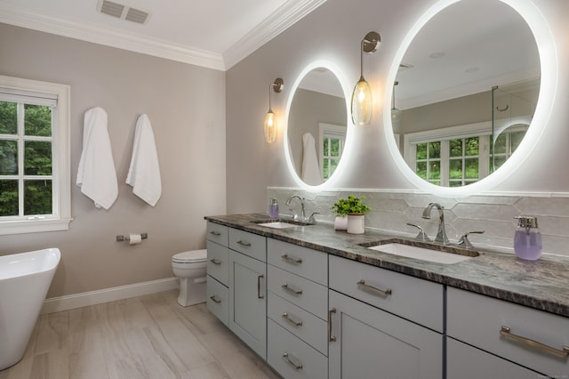 4 Brighton Ln, Simsbury, CT 06070 - full bath with double vanity, a freestanding tub, backsplash, and ornamental molding