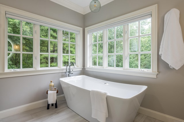 4 Brighton Ln, Simsbury, CT 06070 - bathroom featuring a freestanding bath and crown molding