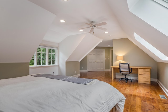 4 Brighton Ln, Simsbury, CT 06070 - bedroom with a skylight, vaulted ceiling, wood finished floors, a ceiling fan, and recessed lighting