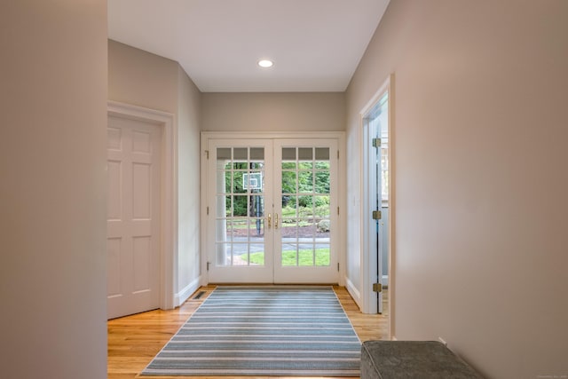 4 Brighton Ln, Simsbury, CT 06070 - doorway with french doors, light wood-style flooring, and recessed lighting