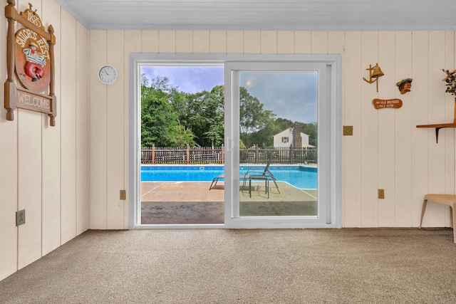 21 Briarcliffe Trl, Old Saybrook, CT 06475 - doorway featuring carpet floors and wood walls