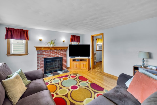 141 Orchard St, Meriden, CT 06450 - living room with wood finished floors and a fireplace