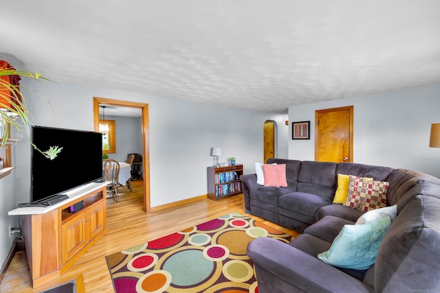 141 Orchard St, Meriden, CT 06450 - living area featuring light wood finished floors and baseboards