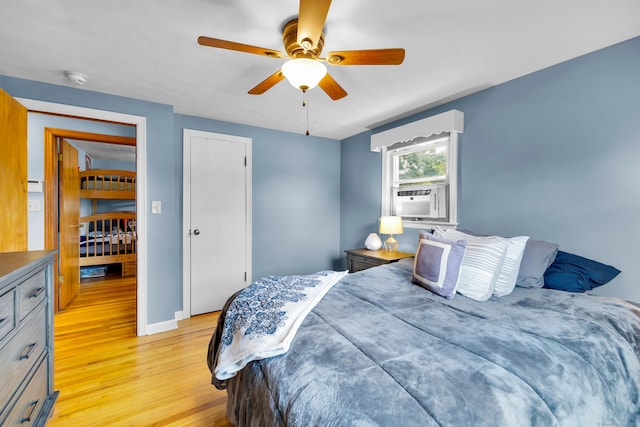 141 Orchard St, Meriden, CT 06450 - bedroom with cooling unit, light wood-style floors, and ceiling fan