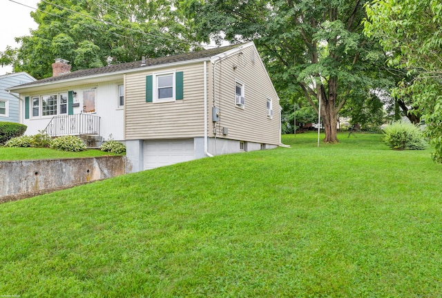 141 Orchard St, Meriden, CT 06450 - ranch-style house featuring a garage, a front lawn, and a chimney