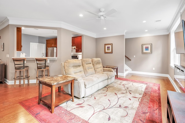 605 Brookside Ct Unit 605, Newtown, CT 06470 - living area with light wood-style floors, recessed lighting, ceiling fan, stairway, and crown molding