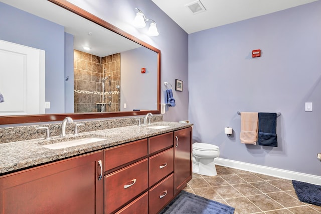 605 Brookside Ct Unit 605, Newtown, CT 06470 - bathroom featuring double vanity, tiled shower, and tile patterned flooring