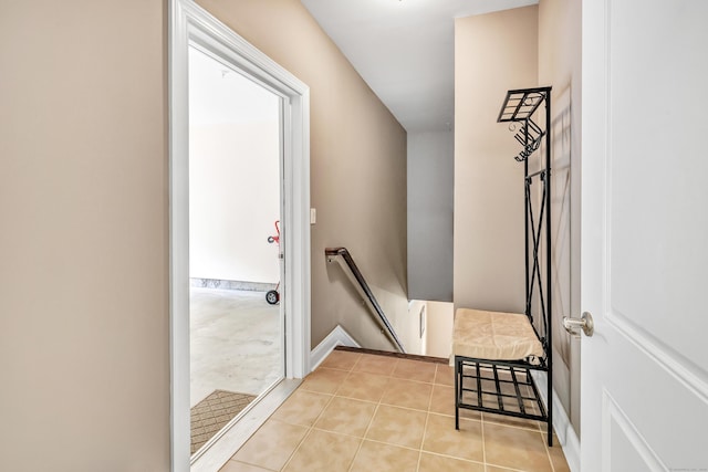 605 Brookside Ct Unit 605, Newtown, CT 06470 - doorway to outside with light tile patterned flooring and baseboards