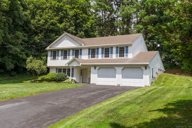 120 Plank Hill Rd, Simsbury, CT 06070 - view of front facade with asphalt driveway, a front yard, and a shingled roof