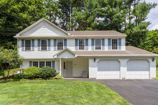 120 Plank Hill Rd, Simsbury, CT 06070 - view of front facade with asphalt driveway, a front yard, a shingled roof, and an attached garage