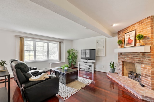 120 Plank Hill Rd, Simsbury, CT 06070 - living room featuring dark wood-style floors, a brick fireplace, and beamed ceiling