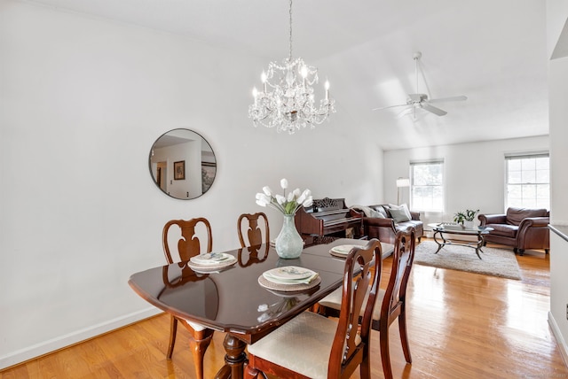 120 Plank Hill Rd, Simsbury, CT 06070 - dining area featuring light wood-style floors, ceiling fan, vaulted ceiling, and a chandelier