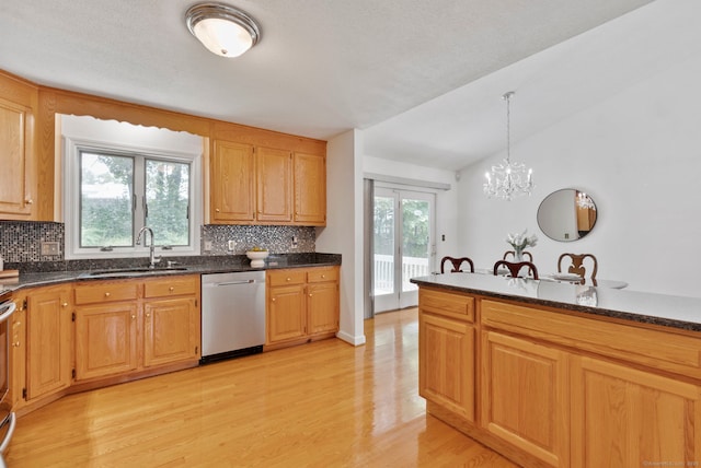120 Plank Hill Rd, Simsbury, CT 06070 - kitchen with appliances with stainless steel finishes, light wood-type flooring, decorative backsplash, a chandelier, and decorative light fixtures