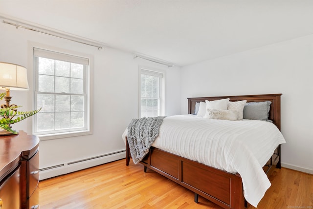 120 Plank Hill Rd, Simsbury, CT 06070 - bedroom with baseboard heating and light wood-type flooring