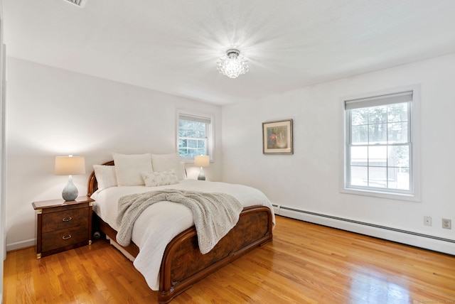 120 Plank Hill Rd, Simsbury, CT 06070 - bedroom featuring baseboard heating and light wood-type flooring