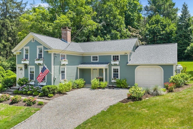 25 Spring St, Chester, CT 06412 - view of front of home with gravel driveway, a chimney, a shingled roof, an attached garage, and a front yard