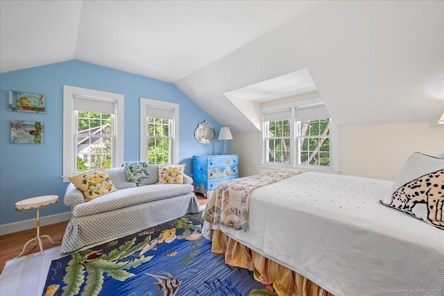 25 Spring St, Chester, CT 06412 - bedroom with lofted ceiling and wood finished floors