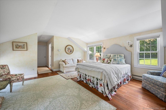 25 Spring St, Chester, CT 06412 - bedroom featuring a baseboard heating unit, wood finished floors, and vaulted ceiling