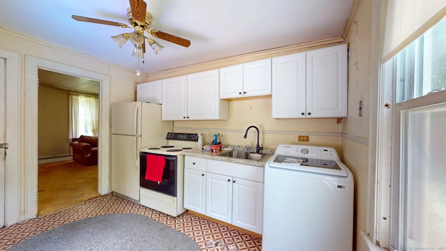 183 Schroback Rd, Plymouth, CT 06782 - kitchen with washer / dryer, white appliances, healthy amount of natural light, a baseboard heating unit, and ornamental molding