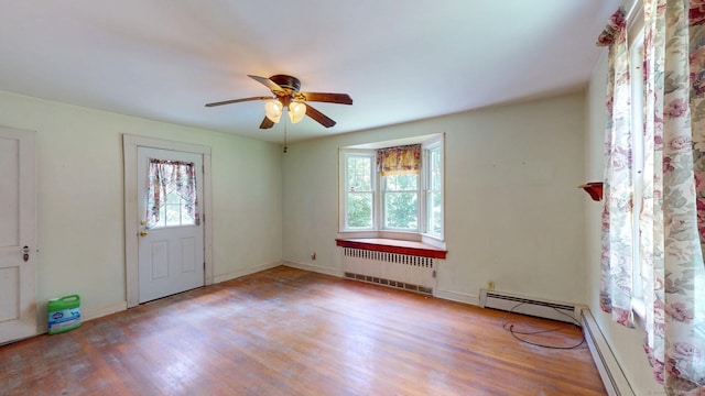 183 Schroback Rd, Plymouth, CT 06782 - entryway featuring radiator heating unit, a baseboard radiator, and wood finished floors