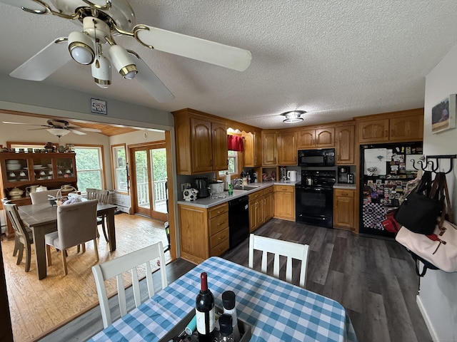 7 School St, Burlington, CT 06013 - kitchen featuring black appliances, light countertops, dark wood-style flooring, ceiling fan, and a textured ceiling