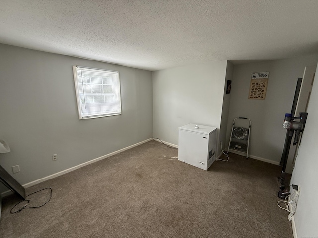 7 School St, Burlington, CT 06013 - unfurnished room with dark colored carpet and a textured ceiling