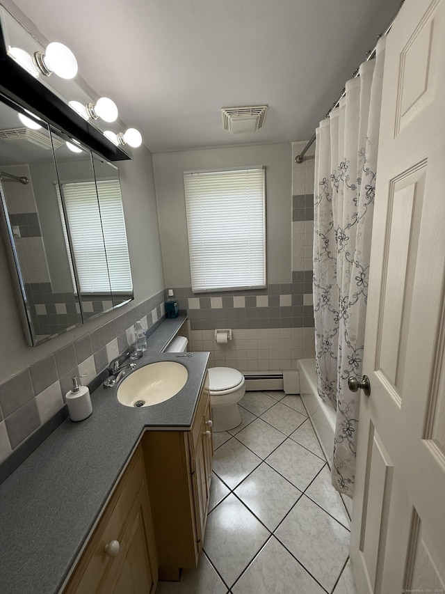 7 School St, Burlington, CT 06013 - full bathroom with vanity, baseboard heating, tile walls, tile patterned flooring, and shower / bathtub combination with curtain