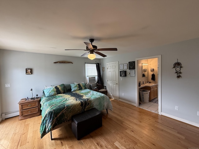 7 School St, Burlington, CT 06013 - bedroom featuring light wood-style floors, cooling unit, a baseboard heating unit, ensuite bathroom, and ceiling fan