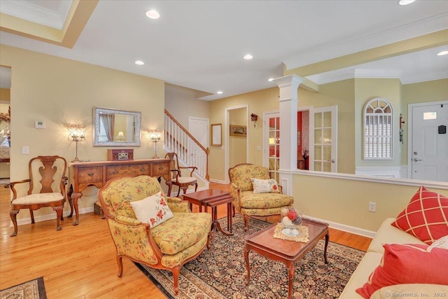 33 Wadsworth Ln Unit 33, Wallingford, CT 06492 - living area with light wood-style floors, ornamental molding, stairway, decorative columns, and recessed lighting