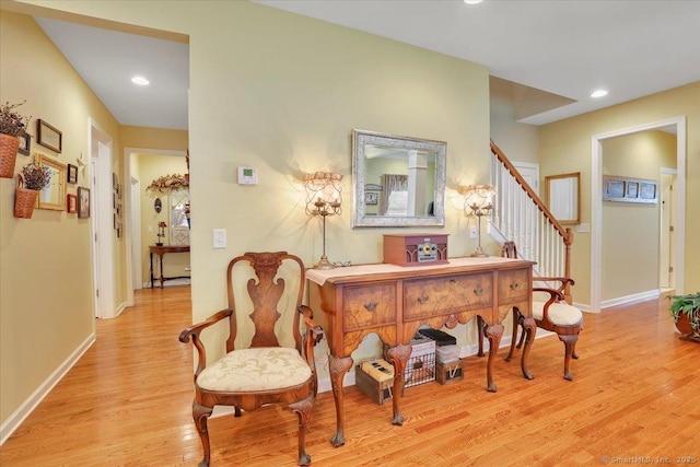 33 Wadsworth Ln Unit 33, Wallingford, CT 06492 - sitting room featuring light wood finished floors, stairway, and recessed lighting