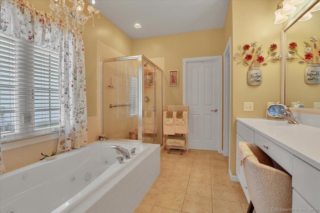 33 Wadsworth Ln Unit 33, Wallingford, CT 06492 - bathroom with a jetted tub, a shower stall, vanity, tile patterned flooring, and a chandelier