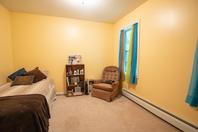 82 Pleasant St, Thomaston, CT 06787 - carpeted bedroom with a baseboard radiator and a textured ceiling