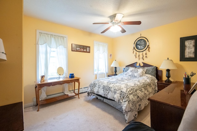 82 Pleasant St, Thomaston, CT 06787 - bedroom with carpet floors, a ceiling fan, and a baseboard radiator