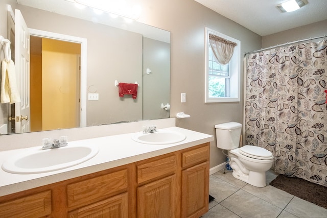 82 Pleasant St, Thomaston, CT 06787 - bathroom with double vanity, tile patterned floors, and a shower with shower curtain