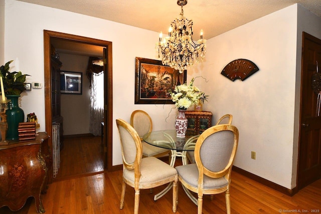400 Williams Rd, Wallingford, CT 06492 - dining area featuring a chandelier and wood finished floors