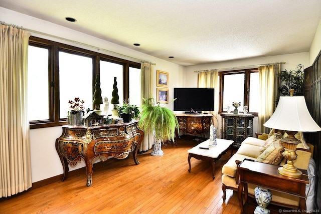 400 Williams Rd, Wallingford, CT 06492 - living room with light wood-type flooring and a textured ceiling
