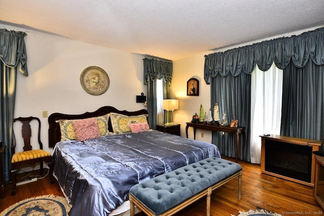 400 Williams Rd, Wallingford, CT 06492 - bedroom with wood finished floors and a textured ceiling