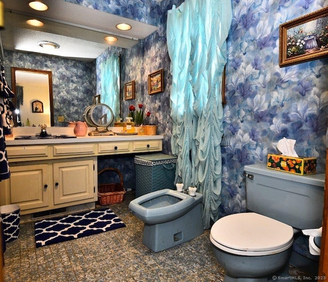 400 Williams Rd, Wallingford, CT 06492 - bathroom featuring wallpapered walls, vanity, and recessed lighting