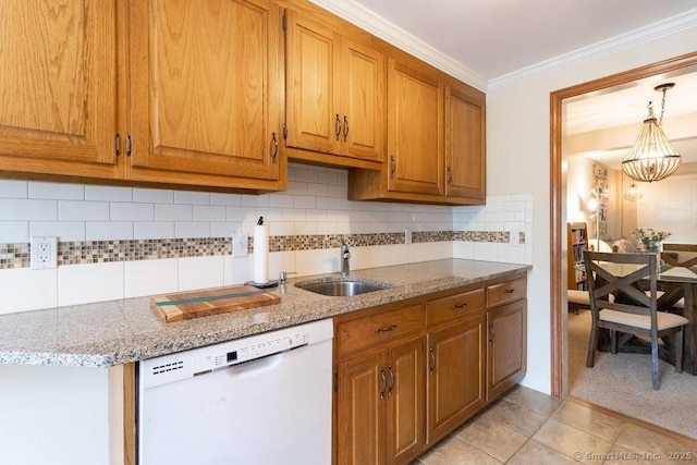 40 Orchard Brook Dr Unit 40, Wethersfield, CT 06109 - kitchen featuring white dishwasher, brown cabinetry, tasteful backsplash, a chandelier, and light stone countertops