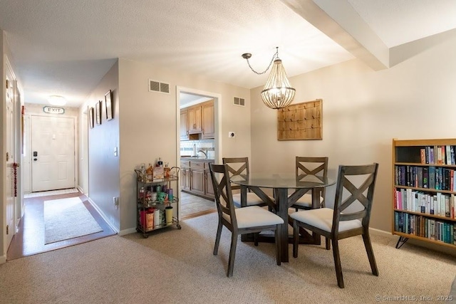 40 Orchard Brook Dr Unit 40, Wethersfield, CT 06109 - dining room with a chandelier and light carpet