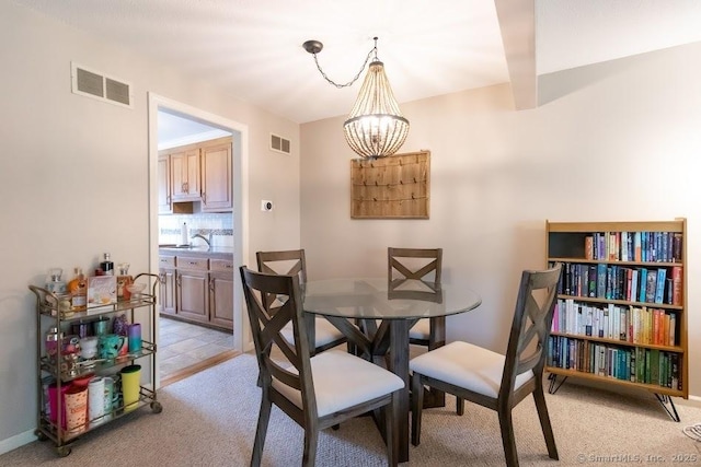 40 Orchard Brook Dr Unit 40, Wethersfield, CT 06109 - dining area with a chandelier and light colored carpet