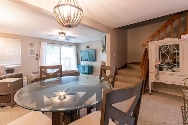 40 Orchard Brook Dr Unit 40, Wethersfield, CT 06109 - dining area with stairway, light carpet, a chandelier, and ceiling fan