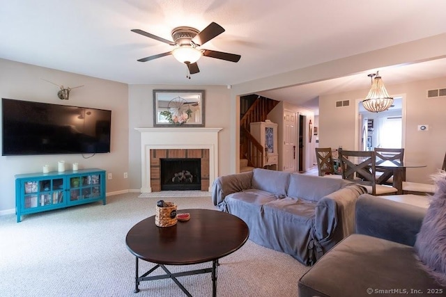 40 Orchard Brook Dr Unit 40, Wethersfield, CT 06109 - carpeted living room featuring stairs, a ceiling fan, and a fireplace with flush hearth