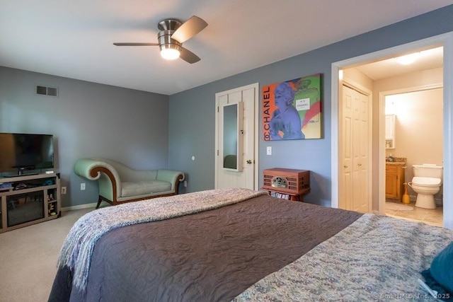 40 Orchard Brook Dr Unit 40, Wethersfield, CT 06109 - bedroom with ensuite bath, light carpet, and ceiling fan