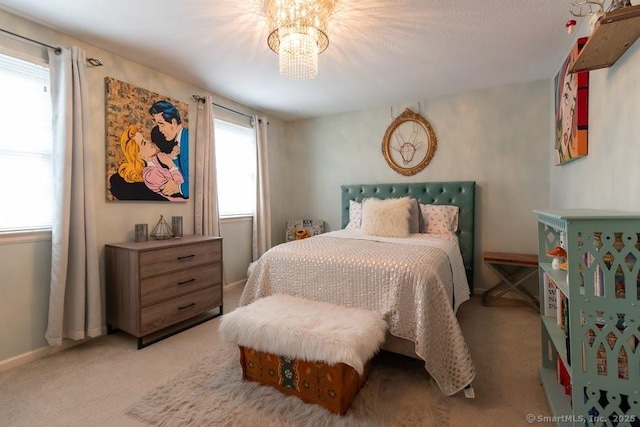 40 Orchard Brook Dr Unit 40, Wethersfield, CT 06109 - bedroom with light colored carpet and a chandelier