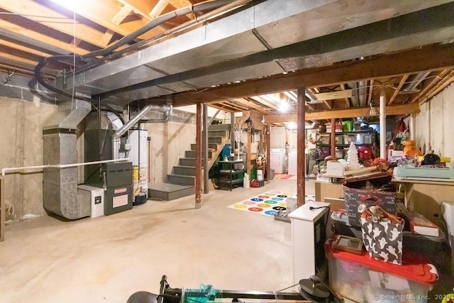 40 Orchard Brook Dr Unit 40, Wethersfield, CT 06109 - unfinished basement with heating unit, stairway, washer / clothes dryer, and water heater