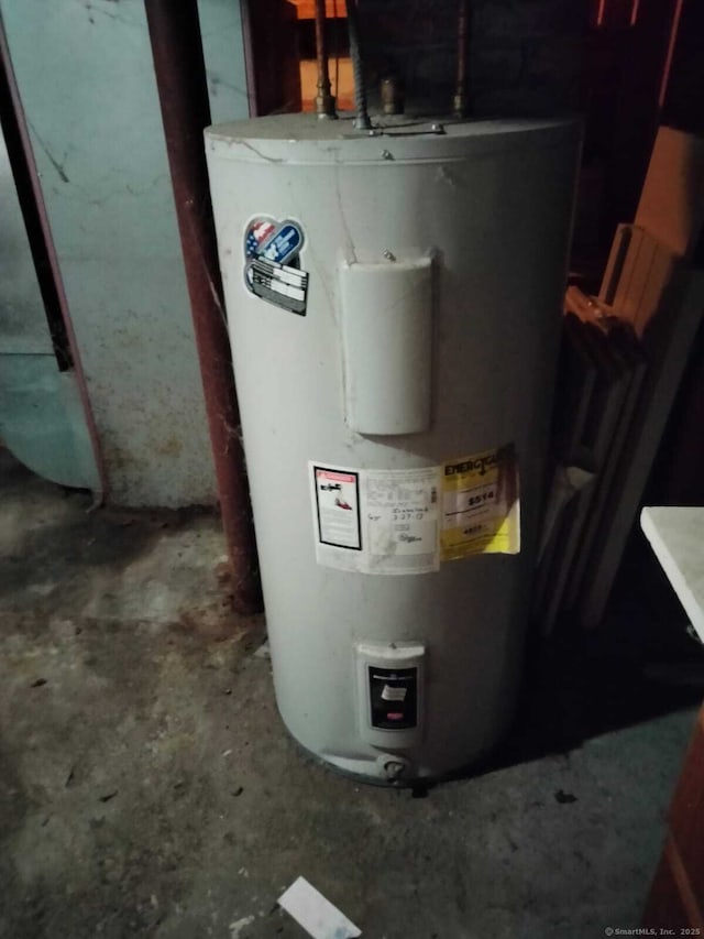 142 S Center St, Windsor Locks, CT 06096 - utility room featuring water heater